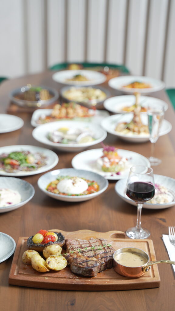 Mediterranean breakfast plate with olives, cheese, and fresh vegetables at Lawin Kitchen, Enfield London